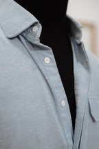 Polera Azul Celeste con Bolsillo en Pecho en Algodón